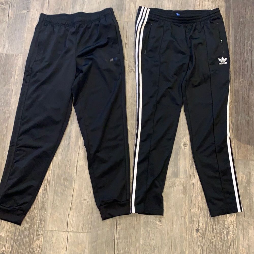 2 pairs of Adidas pants size M for Men.  Pre-owned.